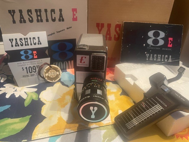 YASHICA 8E 8mm MOVIE CAMERA ORIGINAL BOX, PISTOL GRIP, WRIST STRAP VERY CLEAN!!!