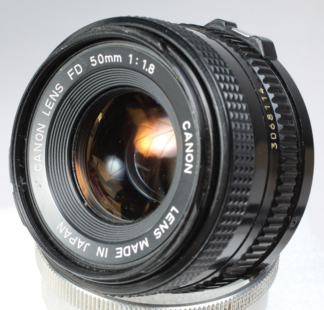 CANON F1 W 50MM F/1.8 FD LENS, HOOD, FLASH MOUNT & CAP SHUTTER GOOD METER IN-OP