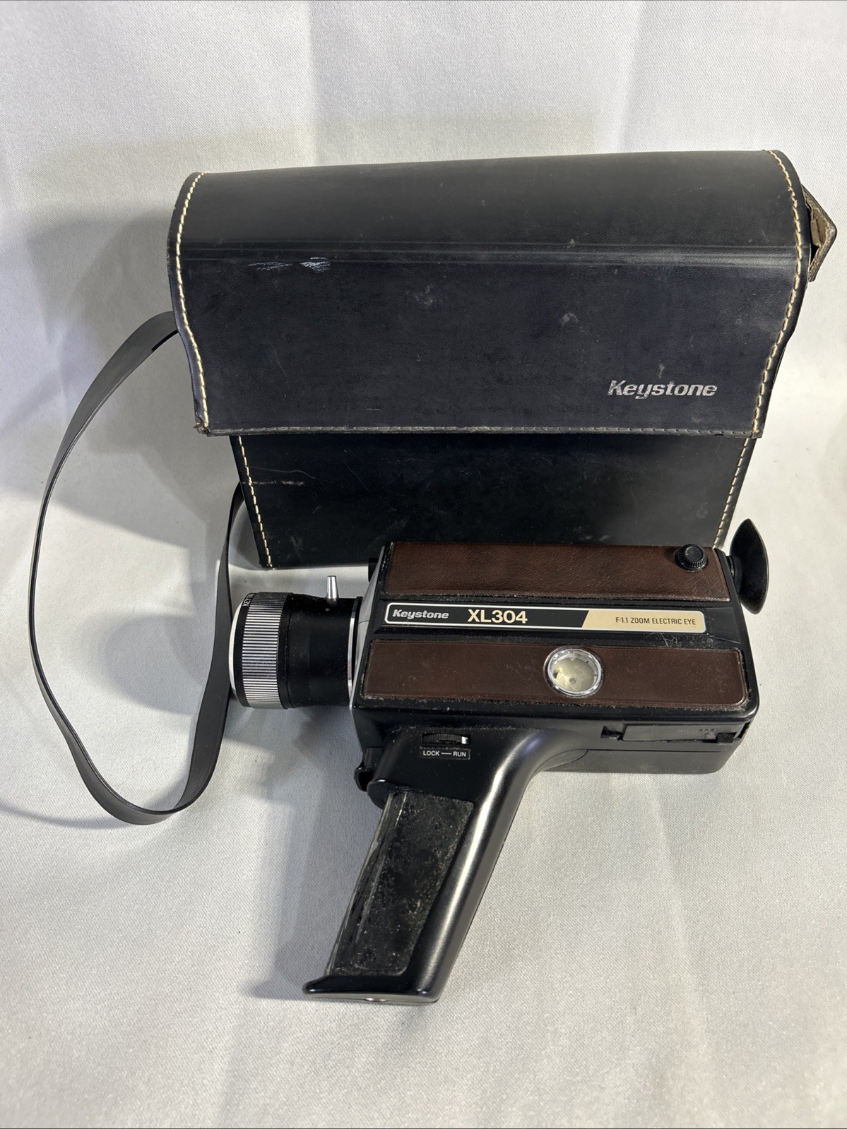 vintage Keystone XL304 Super 8 movie camera with its original carrying case