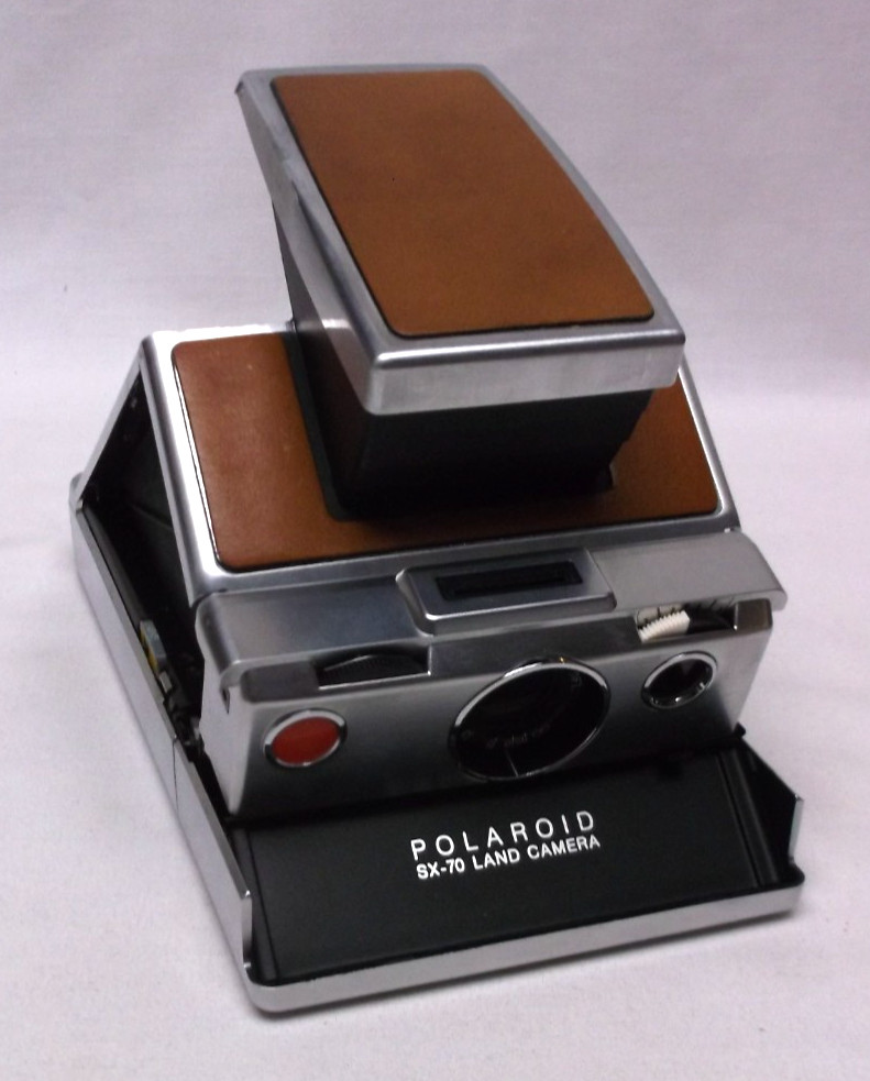 Polaroid SX-70 Land Camera with Electronic Flash and Case with Film