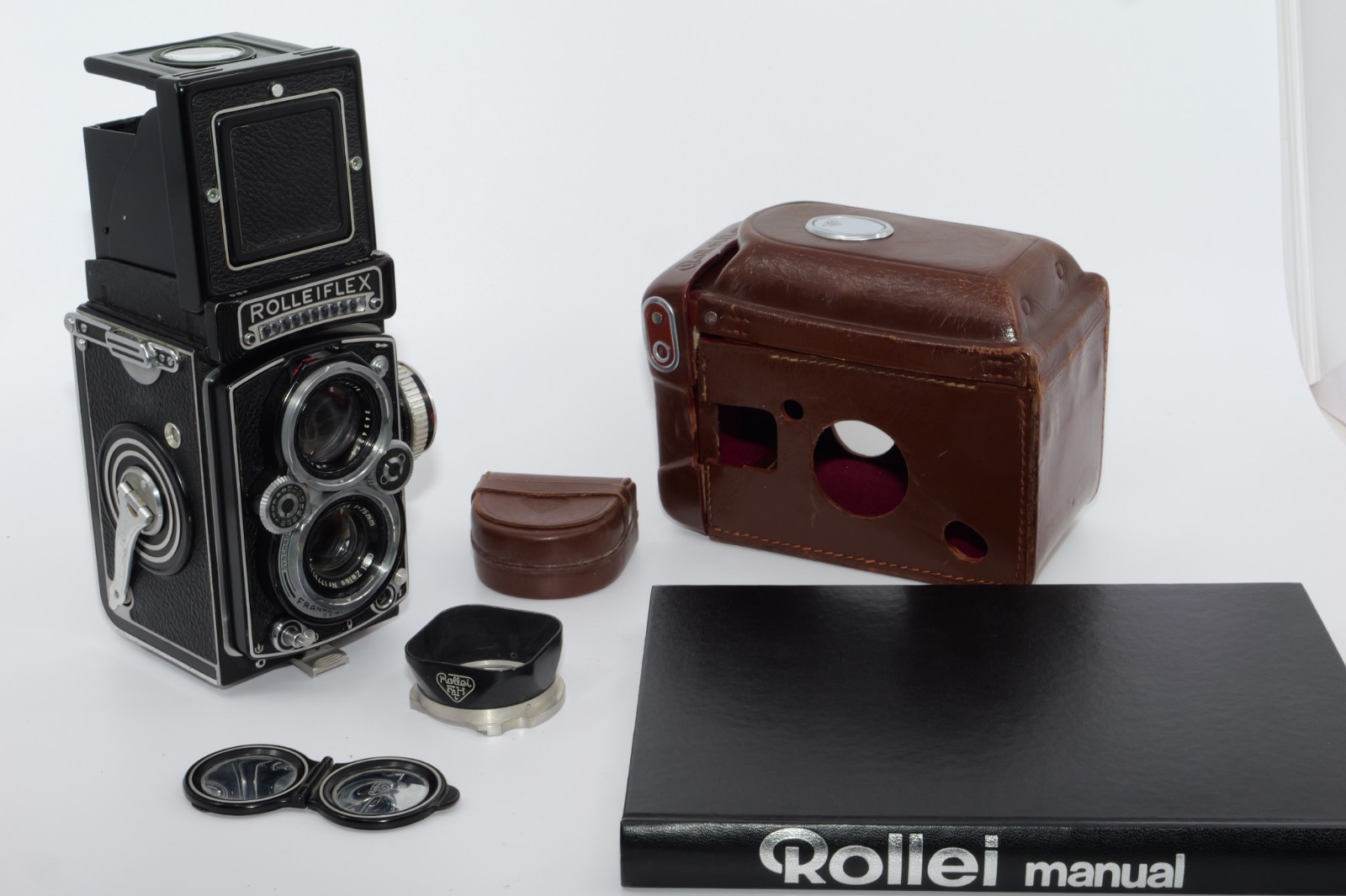 Rolleiflex 3.5E 6x6cm TLR film camera. Type 1. Planar 75mm f3.5. Hood. Case. Cap