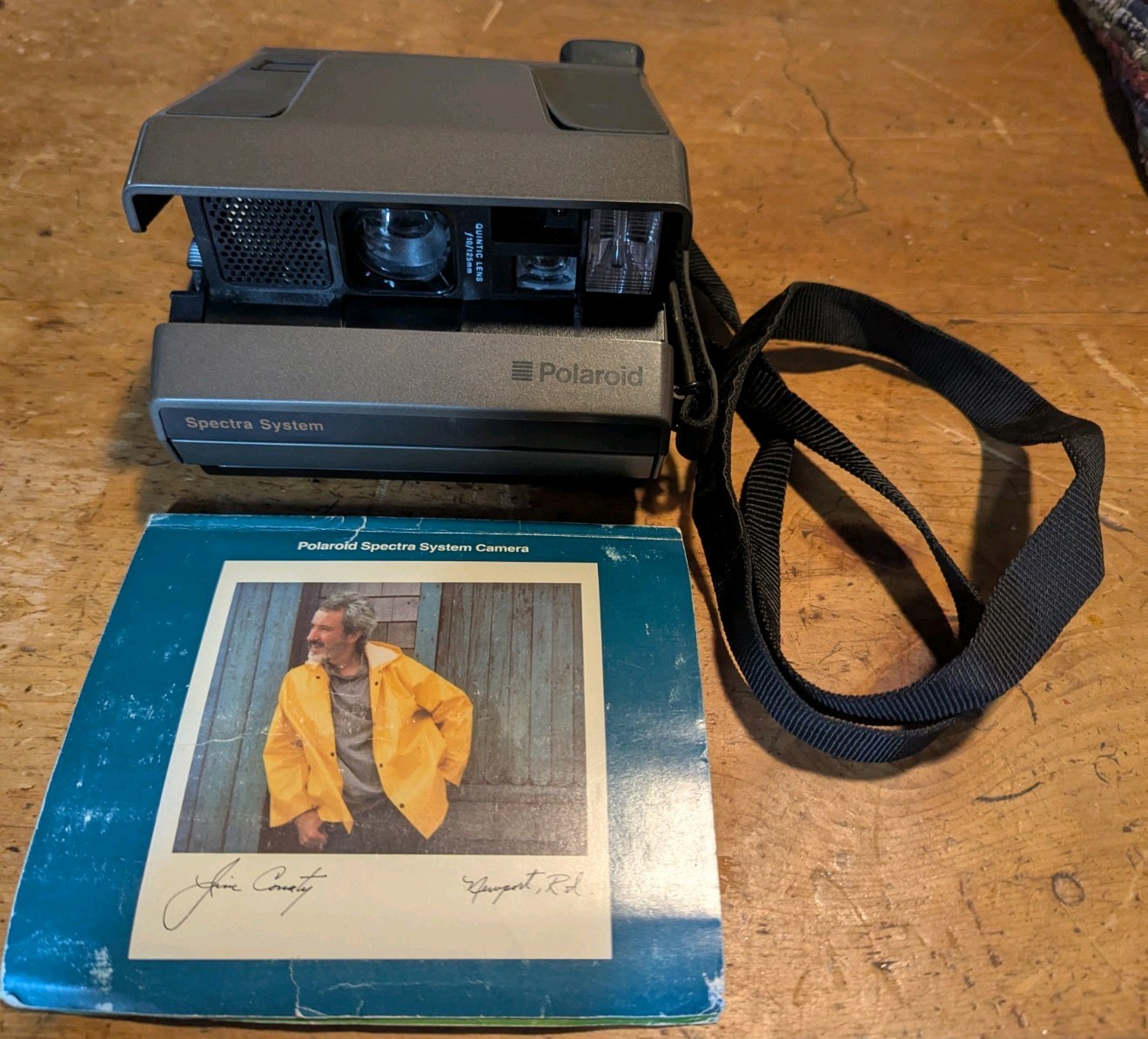 Vintage Polaroid Spectra System Instant Film Camera w handstrap & book untested