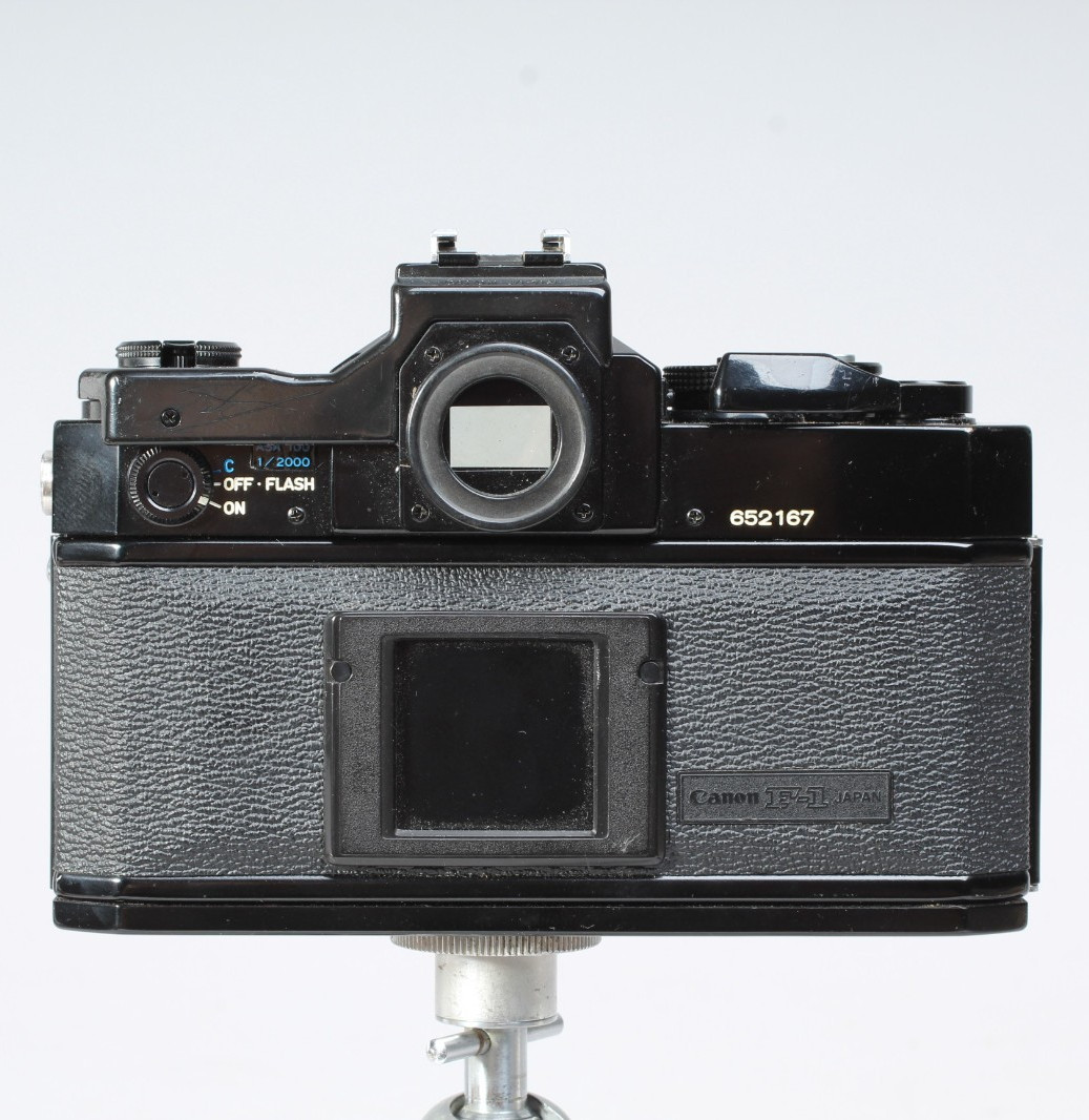 CANON F1 W 50MM F/1.8 FD LENS, HOOD, FLASH MOUNT & CAP SHUTTER GOOD METER IN-OP