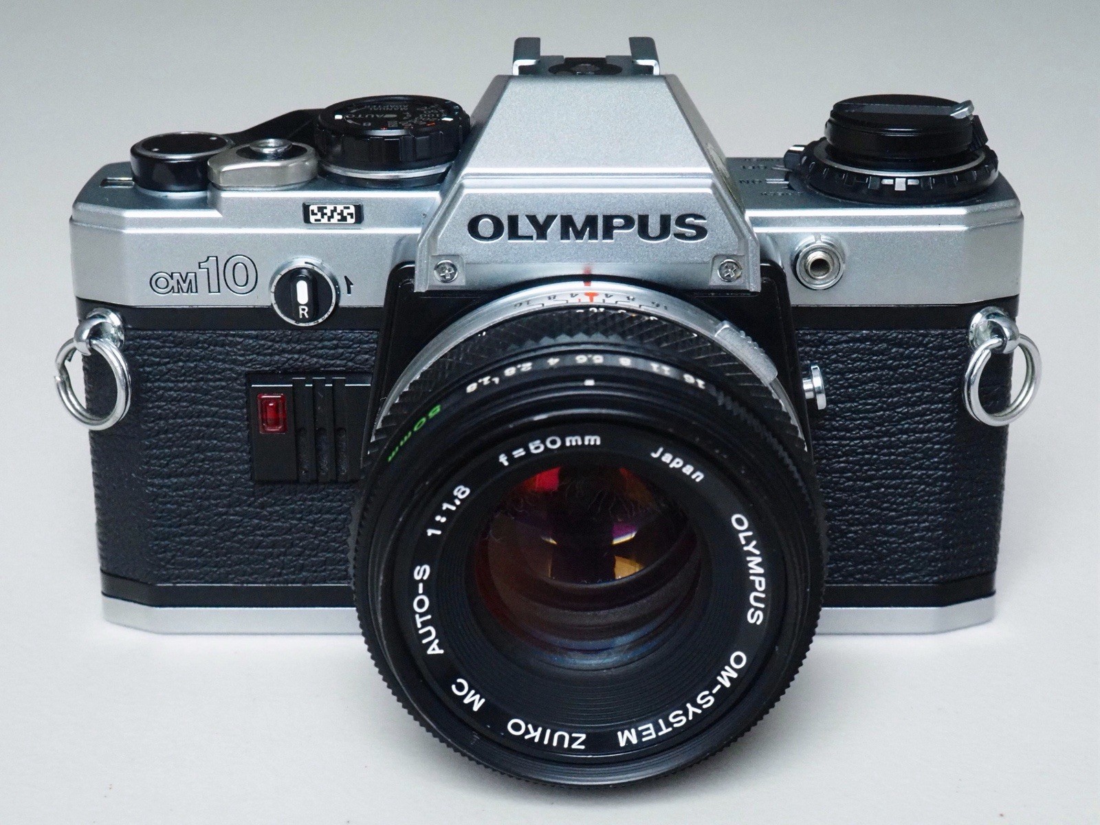 Olympus OM10 w/ Zuiko 50mm lens f/1.8 and T20 flash unit