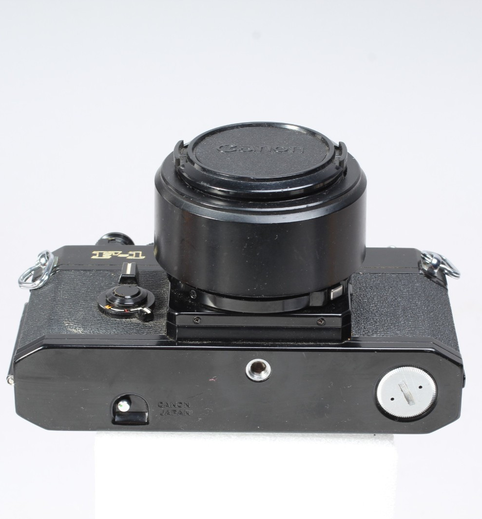 CANON F1 W 50MM F/1.8 FD LENS, HOOD, FLASH MOUNT & CAP SHUTTER GOOD METER IN-OP